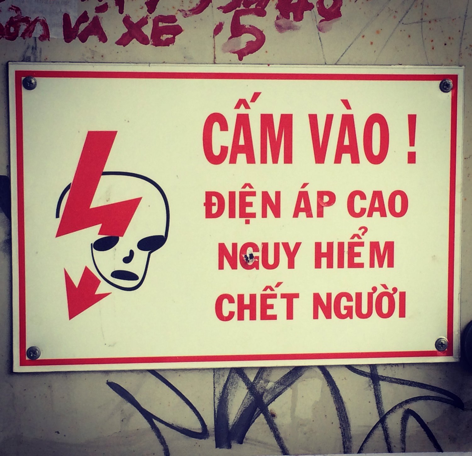 Seen in Nha Trang, Vietnam, electricity warning sign with a touch of Bowie's Aladdin Sane!